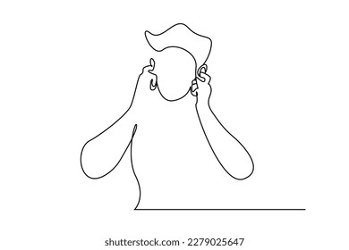 man covering his ears, plugging them in, he doesn't want to hear