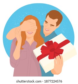 Man covers woman's eyes while standing together with a present box 