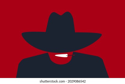 A man in a cowboy hat pulled down over his eyes smokes a cigar.