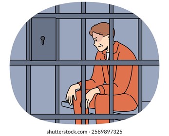 Man criminal sits in prison cell and is sad because of unfair court decision or lack of right to amnesty. Prisoner is serving prison sentence in correctional facility after committing illegal acts.