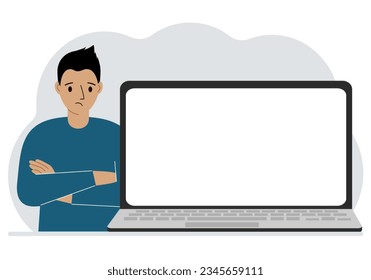 Man crossed his arms near the laptop. The laptop is large and there is room for a test.