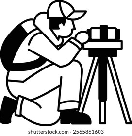 A man is crouching down and looking through a camera. He is wearing a backpack and a hat