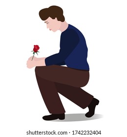 Man Crouching With A Rose In His Hands. Sad Man Isolated On White Background