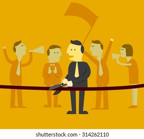 man cutting ribbon