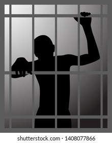 Man in dark dungeon or prison behind bars