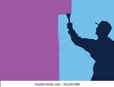 man decorating and painting wall