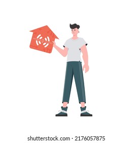 The man is depicted in full growth, holding the icon of the house in his hands. IoT concept. Vector illustration in trendy flat style.