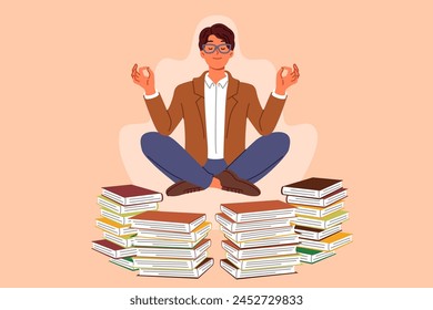 Man does yoga and meditation, taking break from reading books, levitating in lotus position to restore energy. Guy will become interested in yoga practices that help maintain good mental health