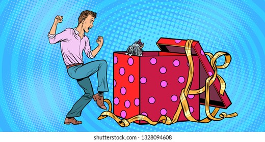 Man and dog puppy as a gift holiday box, funny reaction joy. Pop art retro vector illustration vintage kitsch 50s 60s