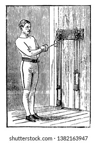 A man doing chest exercise by pulling weights tied on machine from arm at a time. In this exercise, he is pulling weights by taking his left arm near his chest, vintage line drawing or engraving