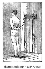 A man doing exercise related to chest in which weights are tied on machine. In this exercise, he is pulling weights by taking his left arm twisted at back, vintage line drawing or engraving