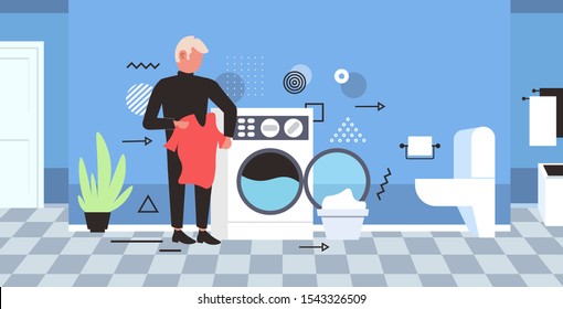 man doing housework guy loading clothes in washing machine cleaning service concept modern bathroom interior horizontal full length sketch vector illustration