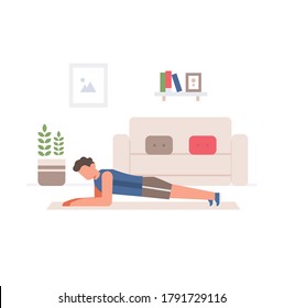 A man doing planks in the house