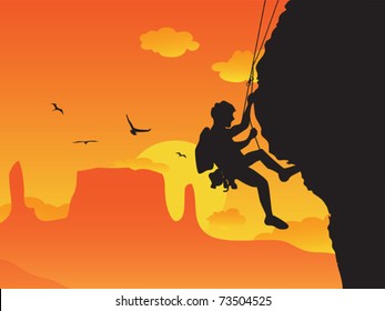 a man doing rock climbing