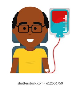man donating blood with glasses