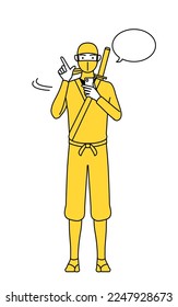 A man dressed up as a ninja operating a smartphone.