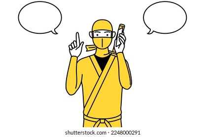 A man dressed up as a ninja pointing while on the phone.