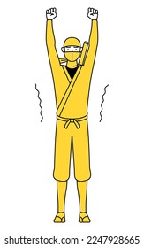 A man dressed up as a ninja stretching and standing tall.