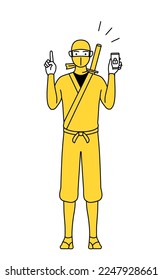 A man dressed up as a ninja taking security measures for his phone.