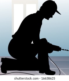 man with drilling machine with chord 	