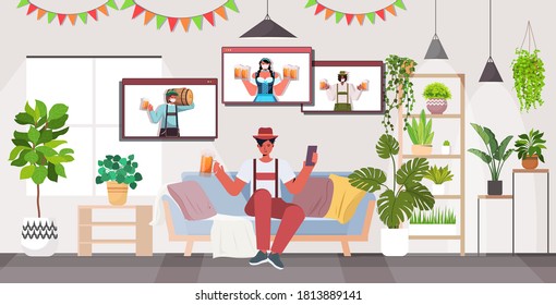 man drinking beer discussing with mix race friends during video call Oktoberfest party celebration coronavirus quarantine self isolation living room interior horizontal vector illustration