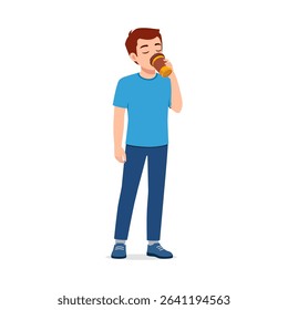 Man drinking from a disposable cup in a casual setting, wearing blue shirt and jeans