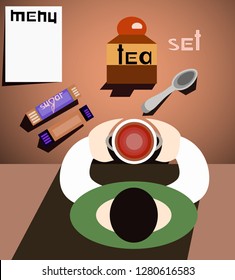 Man drinking tea in a restaurant