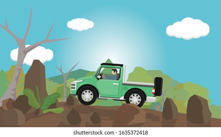 A man drives a pickup truck onto a rocky mountain and beautiful nature.