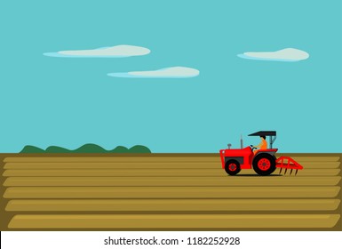 The man is driving a red tractor. In order to plow the soil in the field. Have a natural view as the background