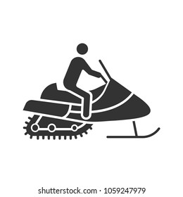 Man driving snowmobile glyph icon. Motor sled driver. Silhouette symbol. Negative space. Vector isolated illustration