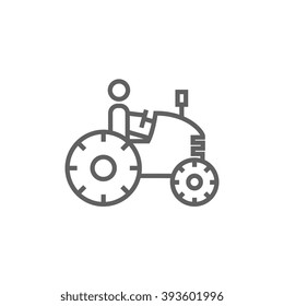 Icono de la línea del tractor de conducción masculina.