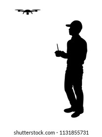 The man with drone and remote control in hand silhouette vector