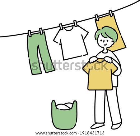 A man drying his washed clothes