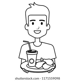 man eating chicken thighs and soda