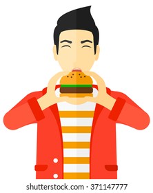 Man eating hamburger. 