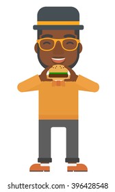 Man eating hamburger. 