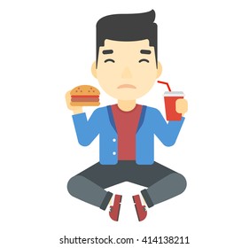 Man eating hamburger. 