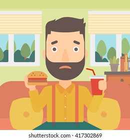 Man eating hamburger. 
