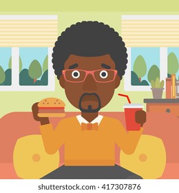 Man eating hamburger. 