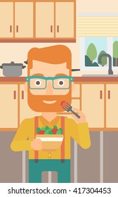 Hombre comiendo ensalada.