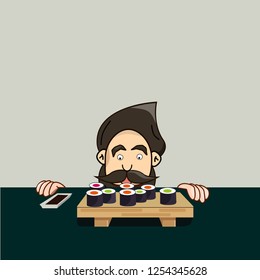 Man eating at a table in a sushi restaurant