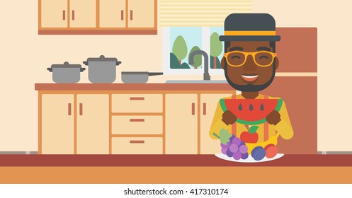 Man eating watermelon.
