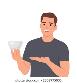El hombre come sopa. Carácter masculino sentado en la mesa, sosteniendo cuchara y plato con delicioso plato aromático.  Ilustración vectorial plana aislada en fondo blanco