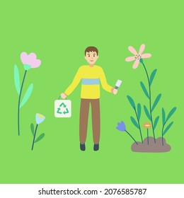 A man with eco light bulb in his hands and a package with a recycling icon on a green natural background.