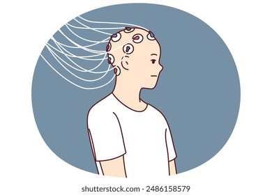 Man with electrodes connected to head to study brain activity and work of neurons or mind control. Wires connected to head of bald guy to develop neurotechnologies or create biorobots