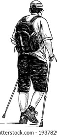 man engaged in Nordic walking