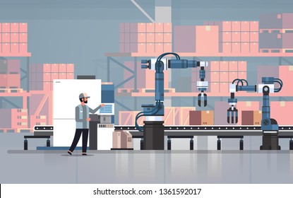 man engineer controlling conveyor belt line robotic hands factory automation production manufacturing process concept warehouse storage interior horizontal