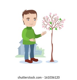 man enjoys a blossoming tree on the background of his home vector