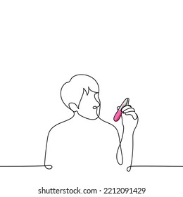 man examines a positive pregnancy test - one line drawing vector. new future father concept