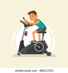 A Man Exercising On Stationary Bike